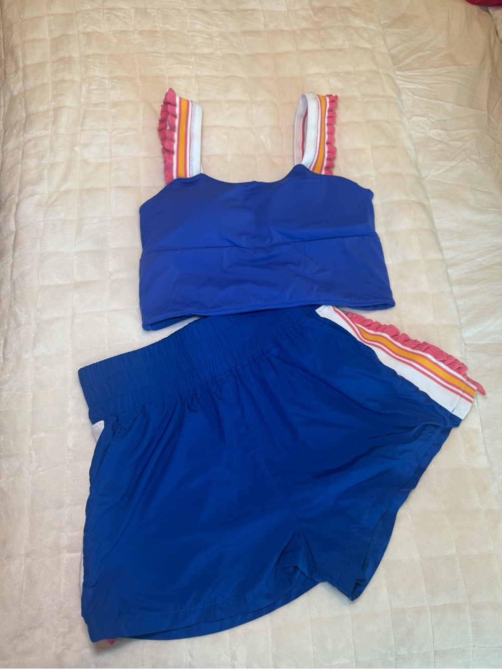 Amazon Women’s Bright Blue Athletic Shorts with Rainbow Stripe and Pink Ruffle
